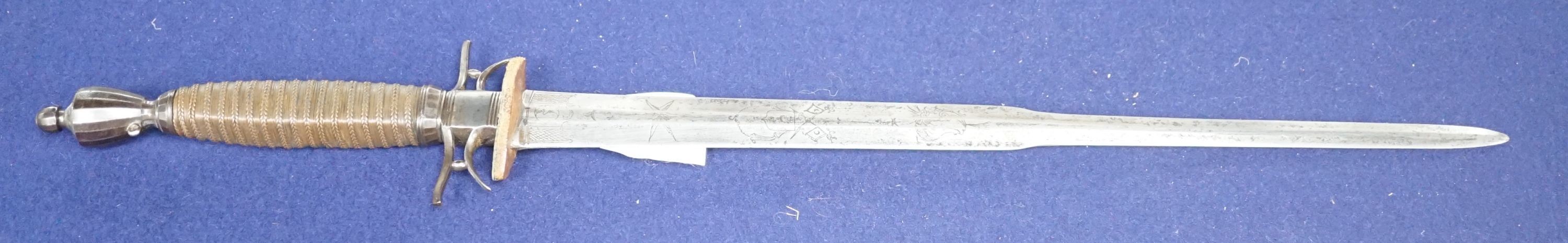 An 18th century German hunting hangar, etched blade. Total length 56.5cm